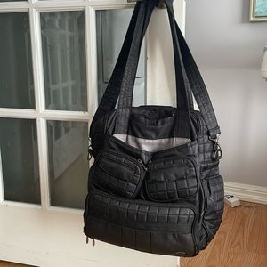 Lug with long crossbody strap large bag